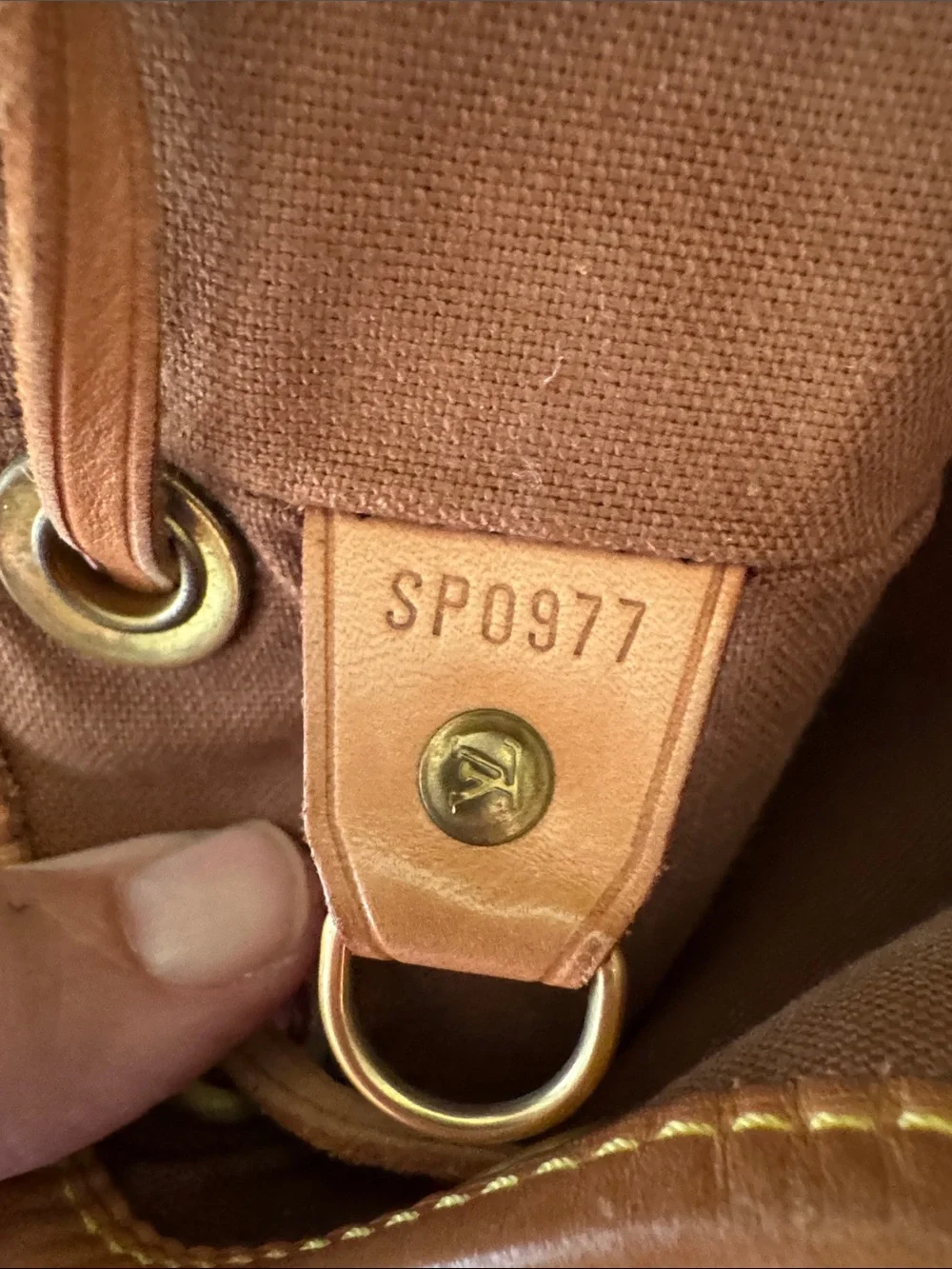 Louis Vuitton Monogram Drawstring Mini Backpack in Brown and Tan Leather Trim